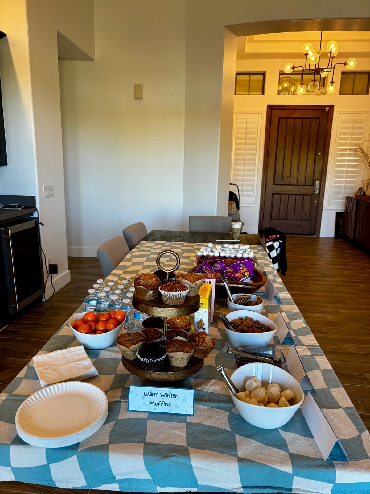 Themed snack spread with warm winter muffins and treats